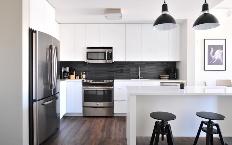 Perfectly organized garage featuring heavy-duty shelving and metal cabinets